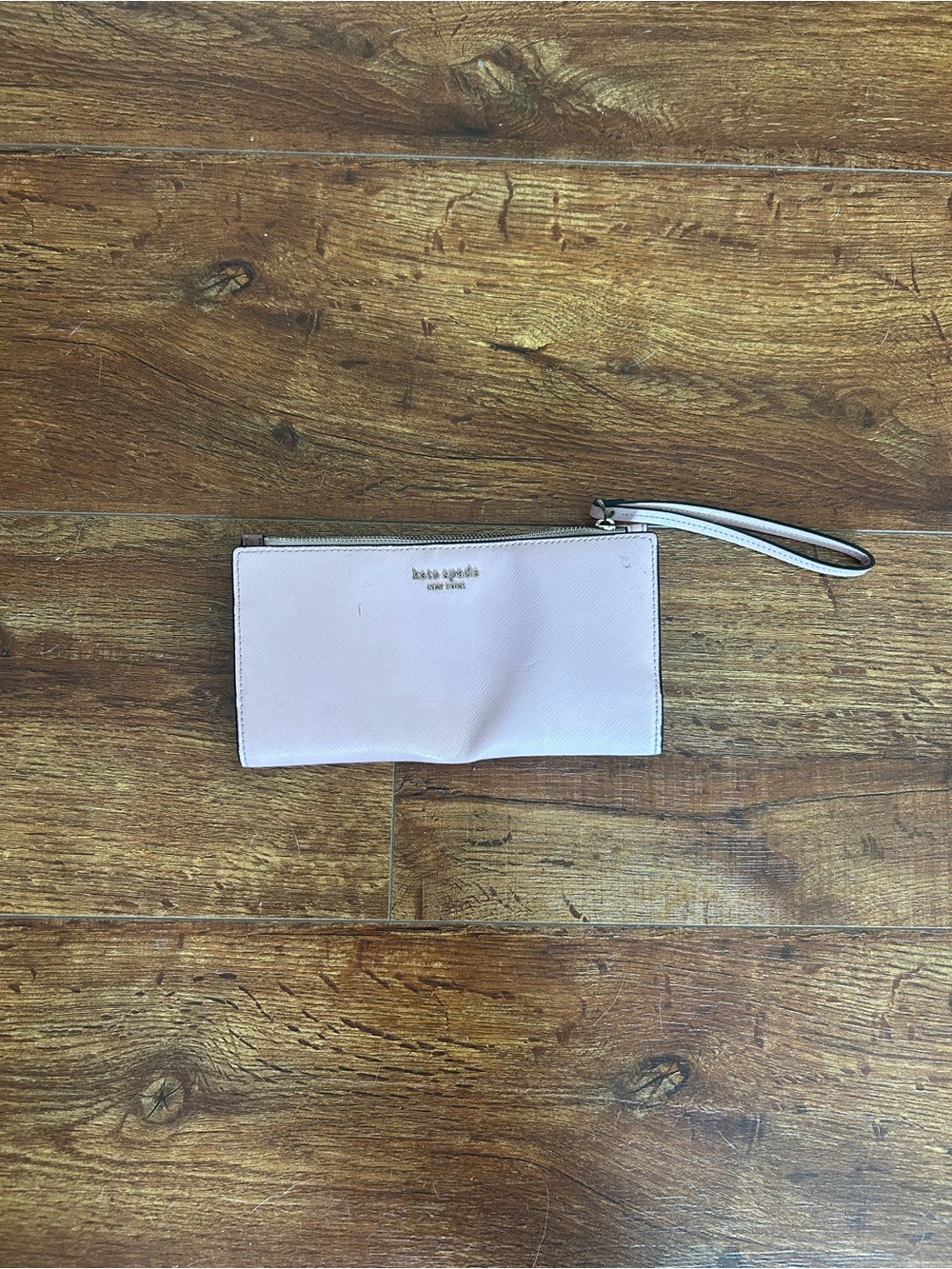 kate spade pale pink leather wristlet clutch with gold logo